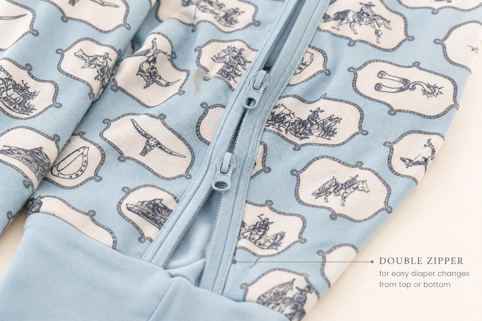 Double zipper detail for easy diaper changes